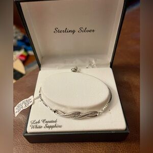 NWT sterling silver bracelet with white sapphires.